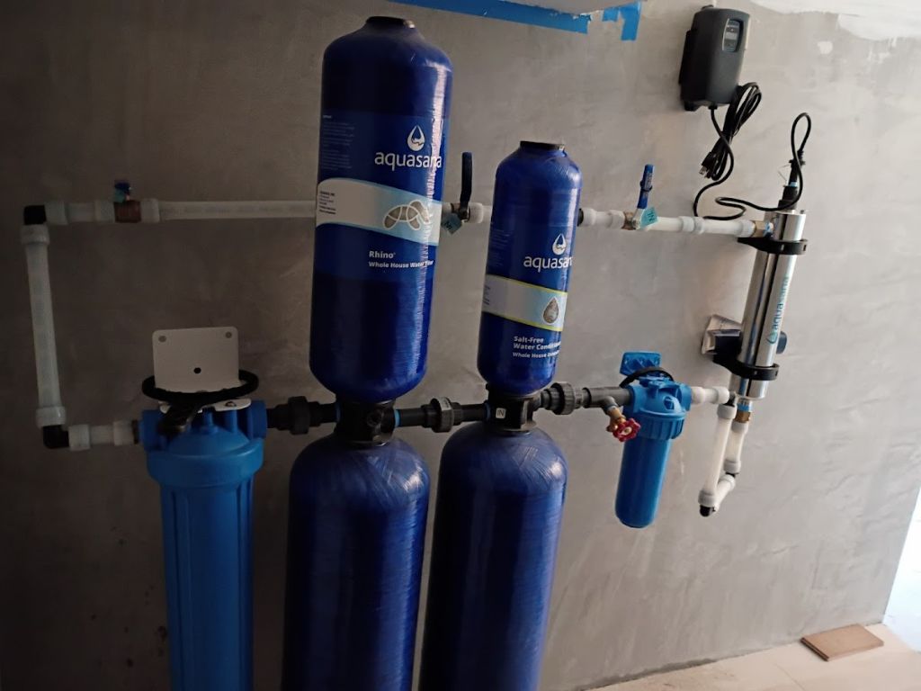 Water Softner installation Whole-house water filtration and softener system installed to reduce hard water minerals, protect plumbing, and improve water quality.